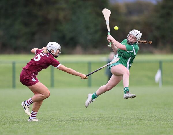 Leah Ryan takes her shot for St Mullins as Caoimhe O'Neill from Naomh Brid tries to block. Leah Ryan takes her shot for St Mullins as Caoimhe O'Neill from Naomh Brid tries to block.