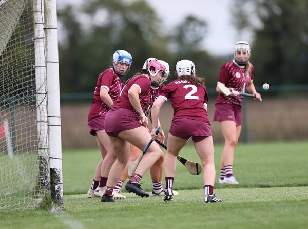 Tara Byrne the Naomh Brid goalkeeper keeps her eye on the ball from a free by Caoimhe Coady from St Mullins. Tara Byrne the Naomh Brid goalkeeper keeps her eye on the ball from a free by Caoimhe Coady from St Mullins.
