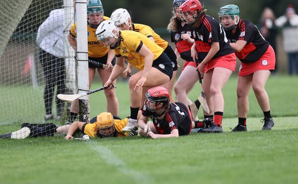 Laura James watches as the ball goes out for a 45 for MLR having gone off Kate Nolan's hurl. Laura James watches as the ball goes out for a 45 for MLR having gone off Kate Nolan's hurl.