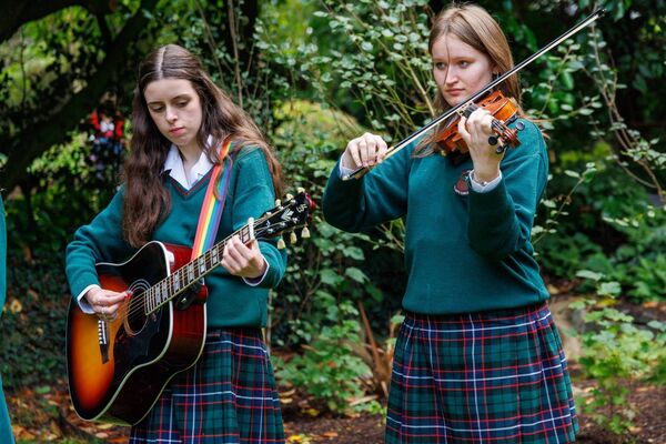 Two musicians from St Leo's College performing at the launch  Two musicians from St Leo's College performing at the launch