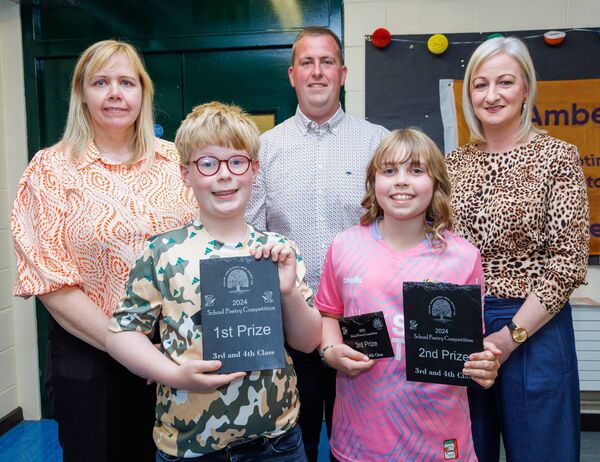 Prizewinners in the third and fourth class poetry category at Tullow Show’s prizegiving Ben Peavoy (Clonegal NS) and Lauren Byrne (Scoil Mhuire Lourdes NS) also shown are Bob Keogh chairman Tullow Show and Elaine Byrne and Deirdre Murphy AIB Tullow