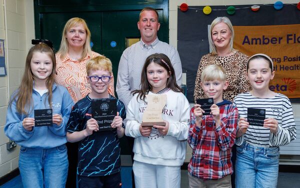 Prizewinners in the first and second cclass handwriting category Grace Murphy (Clonegal NS), Mikie Barron (Borris NS) and highly commended, Ellie Osbourne (Clonegal NS), Jake William (Borris NS), Ronan Cosgrove and Molly Walsh (Clonegal NS) with Bob Keogh, Elaine Byrne and Deirdre Murphy