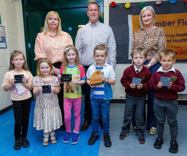 Prizewinners in junior and senior infants handwriting category at the Tullow Show’s prizegiving evening in Tullow Community School were Cillian English (Bennekerry NS), Anna N (Ballon NS), highly commended Jack Plunkett and Jamie Murphy (Clonegal NS), Mollie Conway (Bigstone NS) and Anastasia Milner (St Columba's NS) also pictured Bob Keogh chairman Tullow Show with Elaine Byrne and Deirdre Murphy AIB Tullow