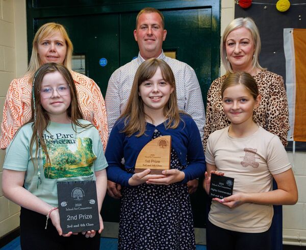 Prizewinners in the third and fourth class art category at Tullow Show’s prizegiving in Tullow Community School, Ella Dagge (Shillelagh NS), Leanne Hannaford (Ballon NS) and Serenity Gutkru (Bennekerry NS), also pictured Bob Keogh chairman Tullow Show with Elaine Byrne and Deirdre Murphy AIB Tullow
