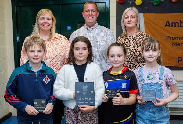 Prizewinners in the first and second class art category Molly Doyle (Clonegal NS), Sofia Brennan (Kildavin NS) and highly commended, Harry Boland (Hacketstown NS) and Faith Byrne (Clonegal NS), also pictured Bob Keogh chairman Tullow Show with Elaine Byrne and Deirdre Murphy AIB Tullow 