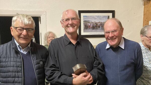 Community pays tribute to retiring postman