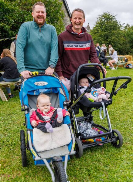 Sean Maher and Kevin Keegan are pictured with their daughter’s Caoimhe and Lillie-Mai at the Ardattin NS and Community Development Group's BBQ at the Ardattin Community Hall. Photo: michaelorourkephotography.ie