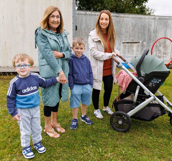 Margaret Jackman is shown with her daughter Nicola and grandchildren Sean and Ciaran Fitzgerald at the Ardattin NS and Community Development Group's BBQ at the Ardattin Community Hall. Photo: michaelorourkephotography.ie
