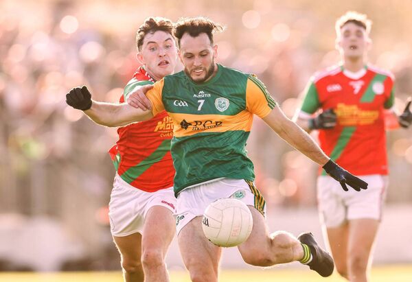 Eric Molloy of Rathvilly is challenged by Kevin Murphy of Palatine Eric Molloy of Rathvilly is challenged by Kevin Murphy of Palatine