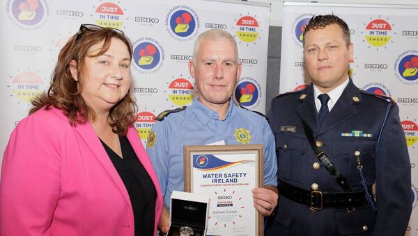 Athy Garda Colman Curran receiving his award from Water Safety Ireland