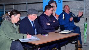 Election candidate listens to farmers