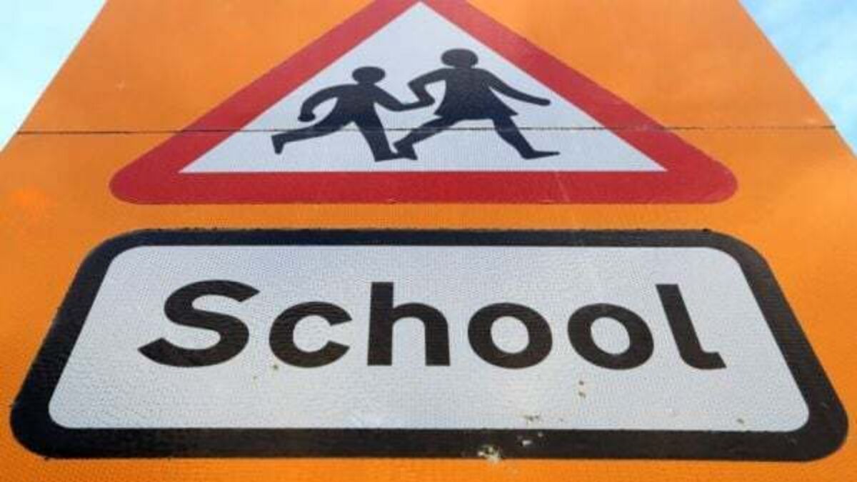 Man arrested on suspicion of indecent exposure outside school