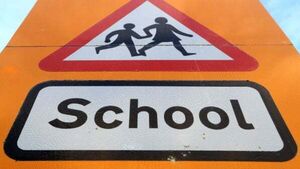 Man arrested on suspicion of indecent exposure outside school