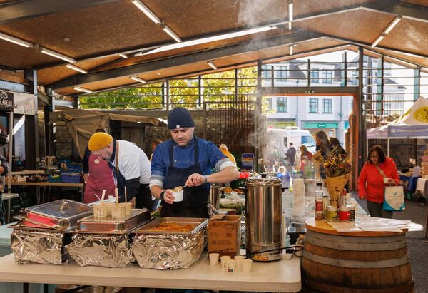 Dominica Marcella prepares a curry dish at the Carlow Farmer’s Market Harvest Festival event