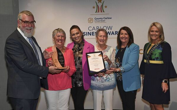 Conal O'Boyle editor of The Nationalist presents the outstanding contribution to business award to Joan Fitzharris, on behalf of her son Shane. Also pictured Shane's sister Sheena McCanny, his aunt Eileen Dalton, cousin cllr Andrea Dalton and Rowena Dooley, Vice President of County Carlow Chamber Conal O'Boyle editor of The Nationalist presents the outstanding contribution to business award to Joan Fitzharris, on behalf of her son Shane. Also pictured Shane's sister Sheena McCanny, his aunt Eileen Dalton, cousin cllr Andrea Dalton and Rowena Dooley, Vice President of County Carlow Chamber