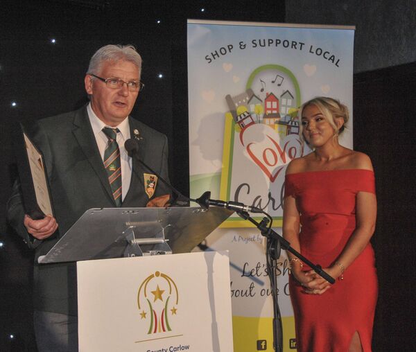 Carlow's Ambassador of the Year winner Eamonn Tracey accepts his award sponsored by Barrow Consultancy and Training at the Carlow Business Awards, alongside MC Shannon Redmond of KCLR Carlow's Ambassador of the Year winner Eamonn Tracey accepts his award sponsored by Barrow Consultancy and Training at the Carlow Business Awards, alongside MC Shannon Redmond of KCLR