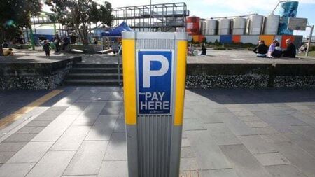 Motorists warned of scam involving fake QR code stickers at parking meters