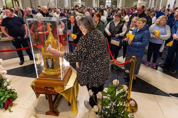 Praying at the Relics of St Bernadette