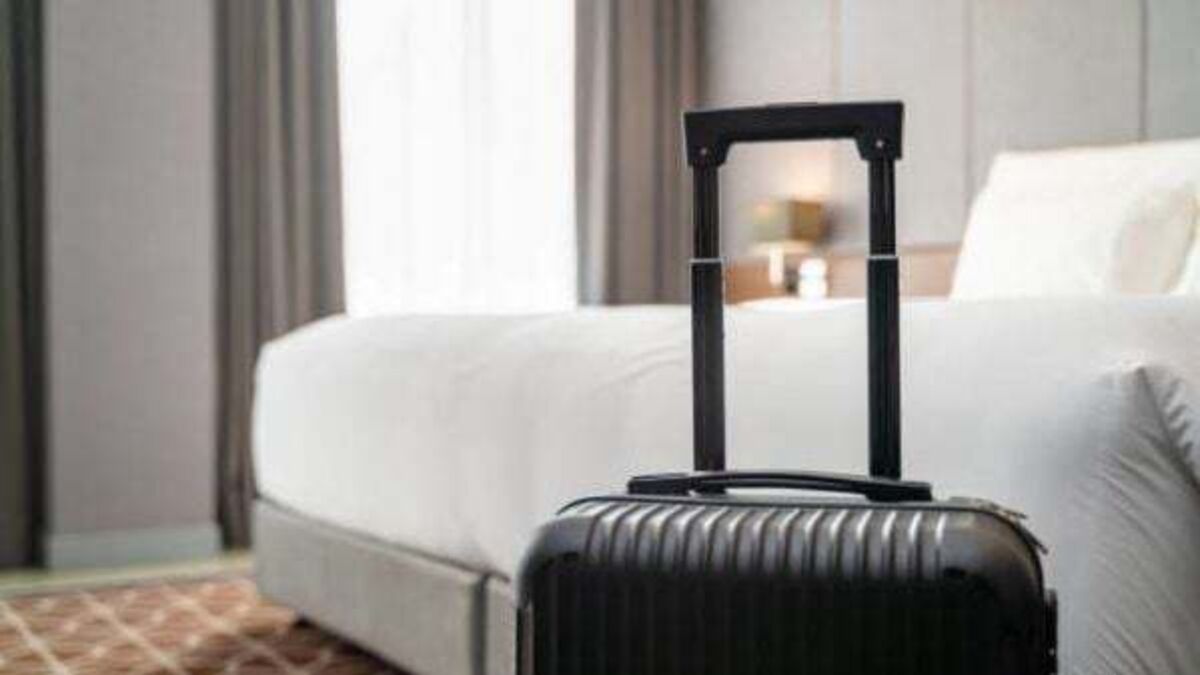 Man jailed for hitting his wife in the face with suitcase in front of their children