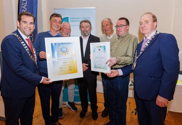 Mayor Fintan Phelan and leas-cathaoirleach Tommy Kinsella present the Special Characteristic Prize and Participation certificate to Trevor Gillespie, Thomas O'Neill and Joe Meany, Pat Olwill and Bob Frazier of the Delta Centre
