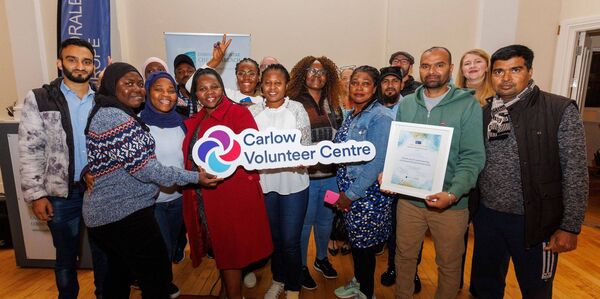 Members of the Volunteer Centre with their participation certificate