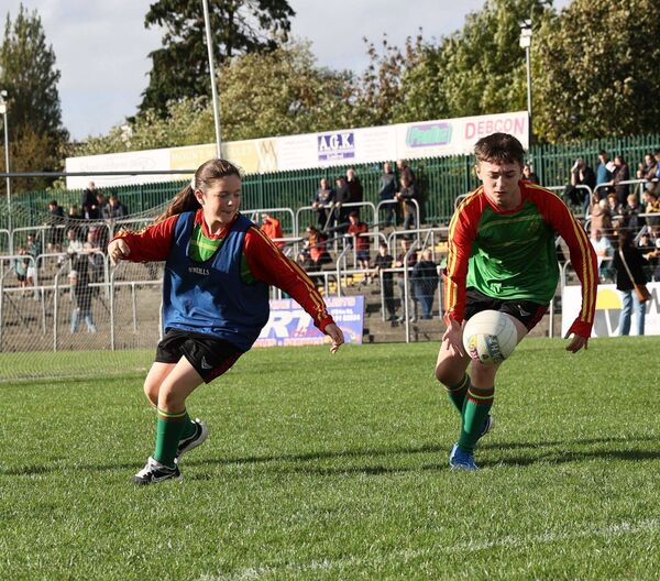 Above and right: students from St Laserian's playing at the county grounds on the biggest day of the year for Co Carlow footballers Above and right: students from St Laserian's playing at the county grounds on the biggest day of the year for Co Carlow footballers