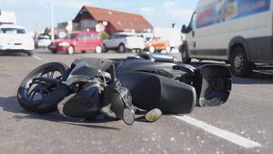 Motorcyclist denies leaving passenger who fell off bike at side of road