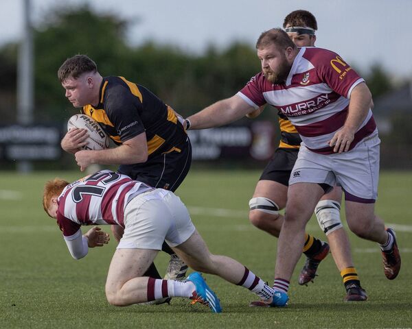 County Carlow's Conor Tracey and Tullow's Dara Cosgrave. Photo: Thomas Nolan Photography.