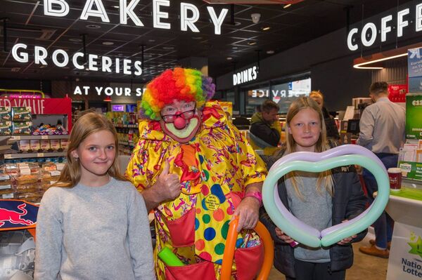 Evelina Kile and Keigija Bulite with Mr Giggles at the family fun day in Spar, Tullow Evelina Kile and Keigija Bulite with Mr Giggles at the family fun day in Spar, Tullow
