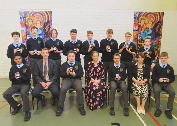 Second year winner (back l/r) Daniel Mullins, Liam Moran, Adam Zych, Eduard Muntean, Cian Scully, Michal Liguzinski, Sean O'Brien and Cian Scully (front l/r) Rafael Renji, Sean Kealy deputy Principal, CJ Doyle, Fiona Lennon principal, Antonio Esposito, Joan McKeon year head and Daniel Kehoe 