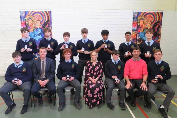 TY award winners (back l/r) Joseph Kennedy, Ivans Loskarjovs, Aaron Carberry, Jack Moran, Alif Sadat, Eshaan Singh, Leon Fitzgerald (front l/r) Leon O'Brien, Sean Kealy deputy principal), Kyle McDonald, Fiona Lennon principal, Caleb Noctor, Maurice Browne year head and Conor Dunne. Missing from photo Alan Karpinski