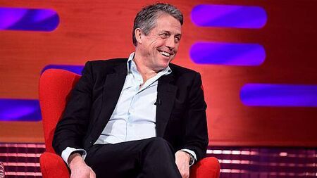 Hugh Grant on doing shots with Travis Kelce at Taylor Swift gig: We went crazy