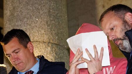 Two locals charged in connection to murder