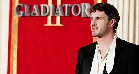 Paul Mescal sports his suave 70s style alongside King at Gladiator 2 premiere