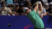 Rory McIlroy holds share of lead at DP World Tour Championship