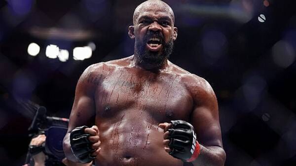 Jon Jones keeps heavyweight belt at UFC 309