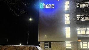 Election candidate defends laser display on hospital cancer wing