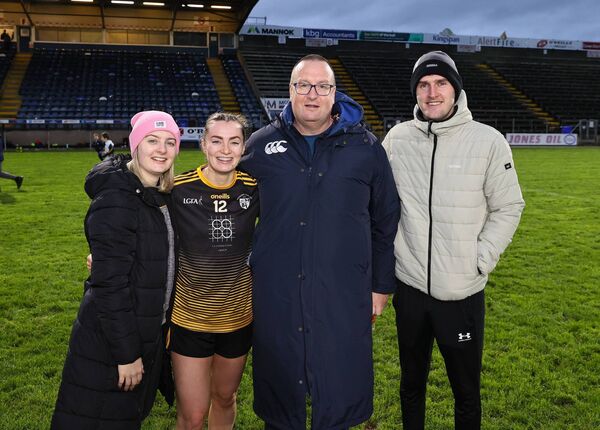 A thrilled Lauren Dwyer with her dad John and family Photo: Pat Ahern