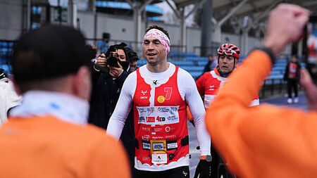 Kevin Sinfield defies injury to complete latest MND quest as donations pass £1m