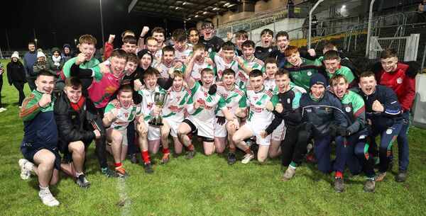Palatine captain Josh Egan leads the celebrations for Palatine under 20 footballers Photo: Pat Ahern