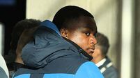 Schoolboy reacted in fear when he attacked gunman in busy restaurant, court told