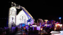 Church spire collapses to ground in flames after lightning strike