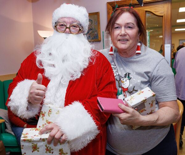 Maeve Doyle as Santa and Olive Dunphy