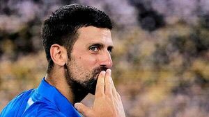 Novak Djokovic sets new grand slam record to reach Australian Open third round