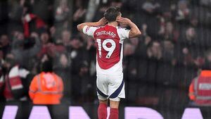 Arsenal hit back to beat Tottenham and reignite title challenge