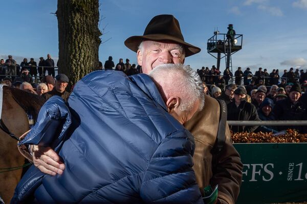 Owner of Nick Rockett Stewart Andrew hugs trainer Willie Mullins after winning The Goffs Thyestes Handicap Steeplechase Photo: ©INPHO/Morgan Treacy