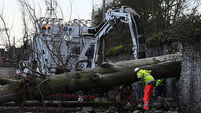 56,000 homes and businesses still without power and 460 without water