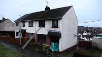 Man arrested on suspicion of arson after four people rescued from burning house