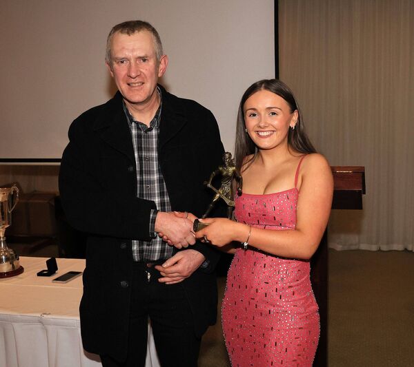 Jim Cranny presents Katie Kinsella with the Burren Rangers Minor Camogie Player of the Year Award