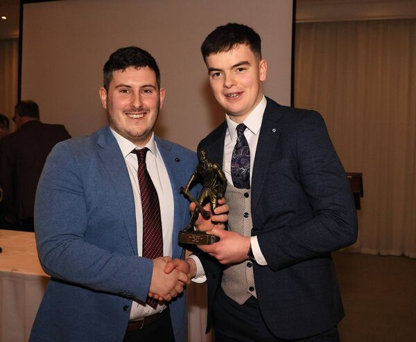 Billy Shanahan presents Cathal Healy with the Burren Rangers Under 20 Player of the Year Award